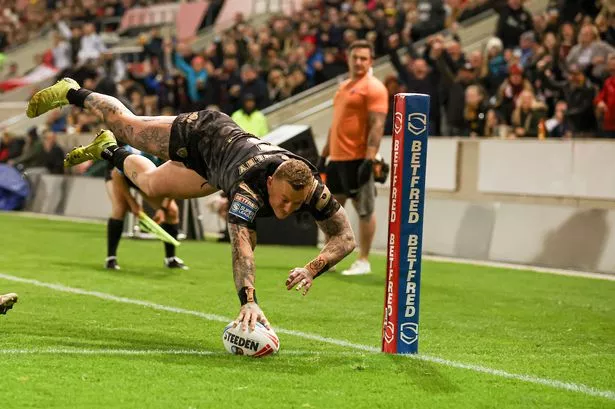 Josh Charnley stretchered from the field after awful-looking incident