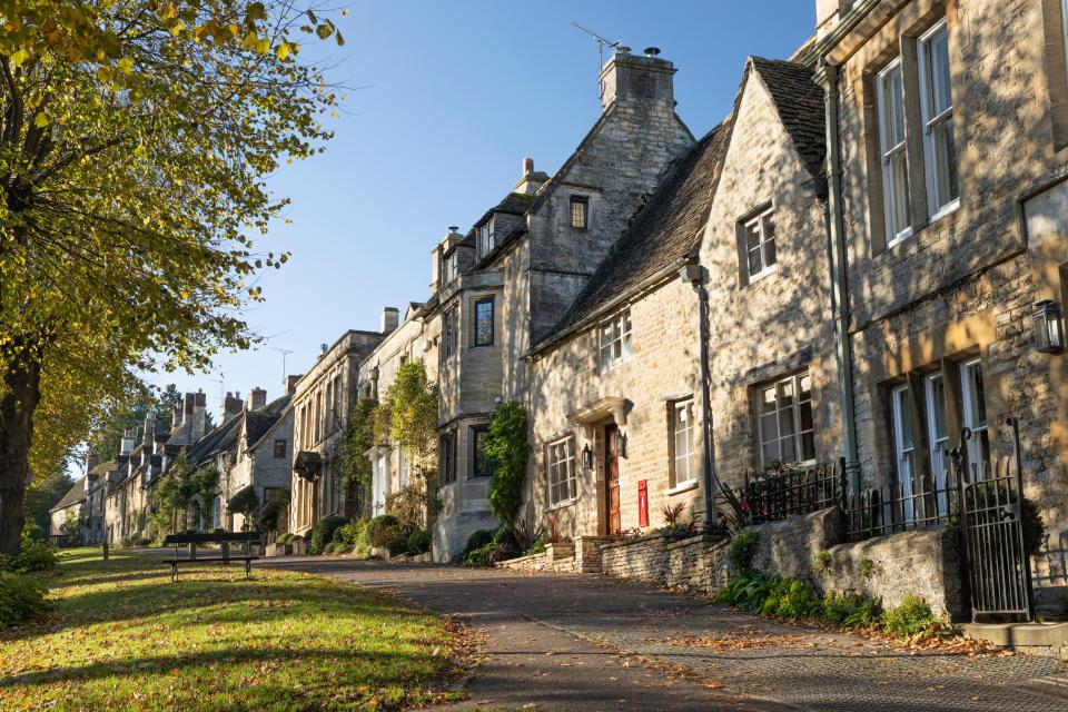 The pretty village is lined with Cotswolds stone cottages