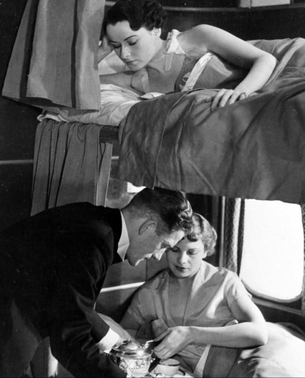 In the 1950s, luxury services like BOAC's Monarch service offered bunks for passengers, with breakfast served in bed from silver tea sets