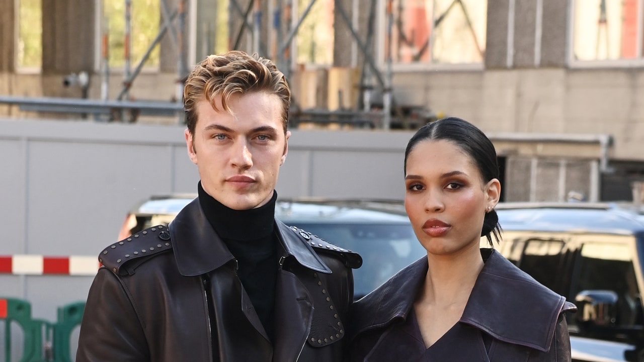 Nara Smith And Lucky Blue Smith Twin In Trench Coats At Burberry’s SS25 Show