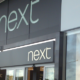 Next warns it could close stores and halt openings over equal pay claim appeal