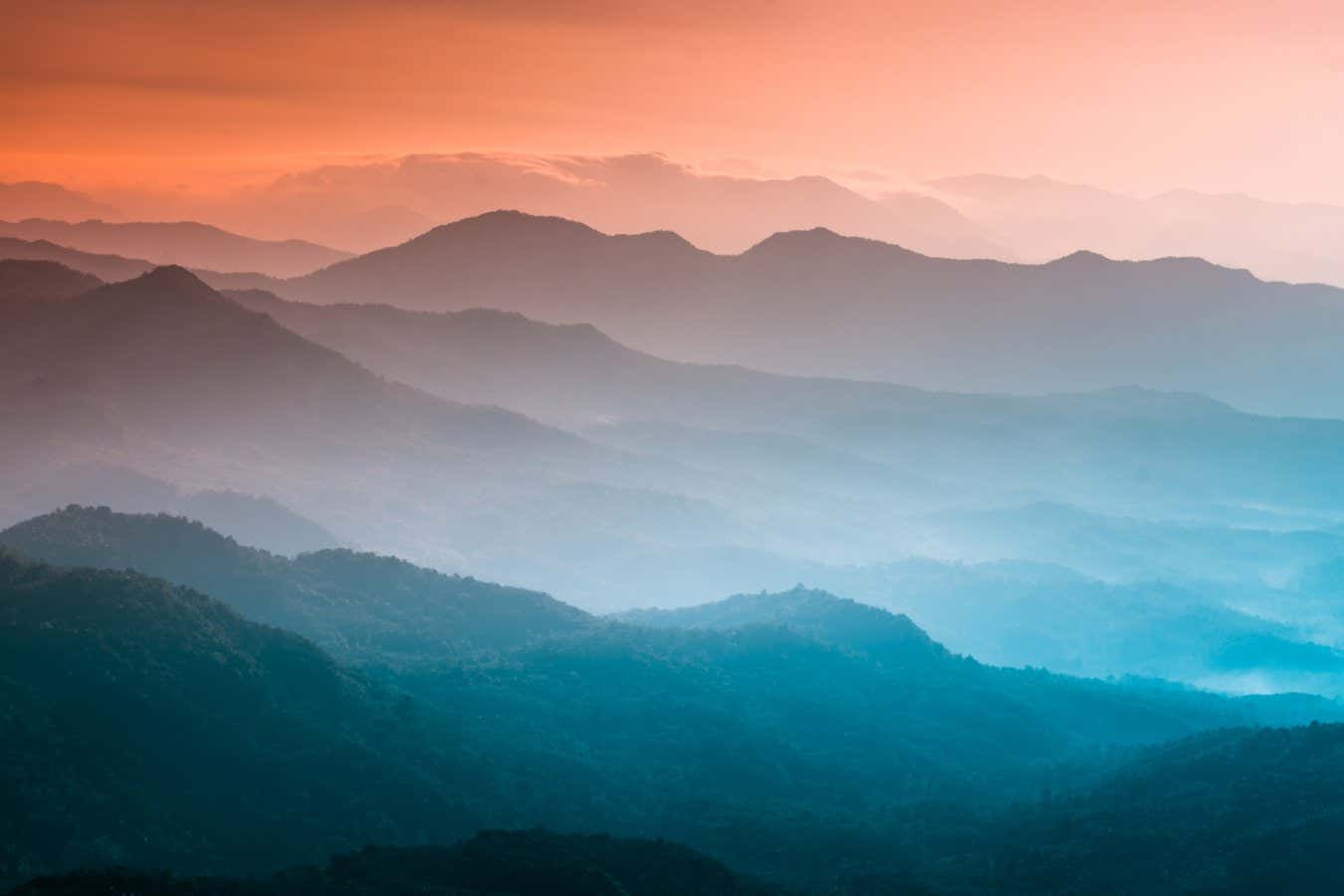 Mountains under mist in the morning Amazing nature scenery form Kerala God