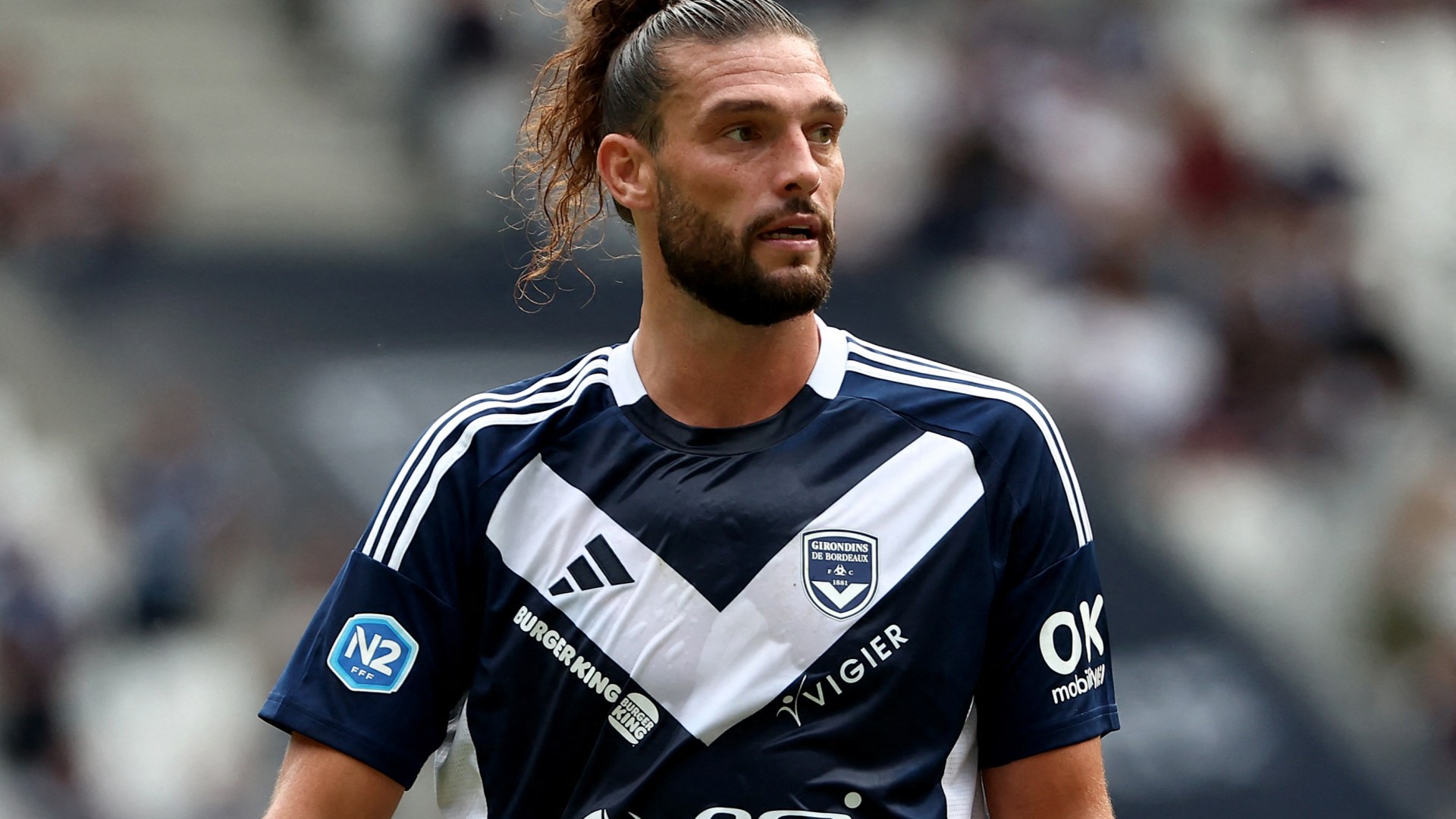 Andy Carroll, 35, reveals plan to keep playing for Bordeaux until he's 40 - despite LOSING money on £750-a-week salary