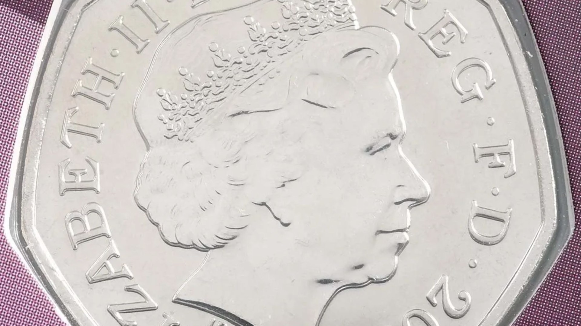 A 50p coin hidden in your change could be a ‘true gem’ thanks to key details - how to check