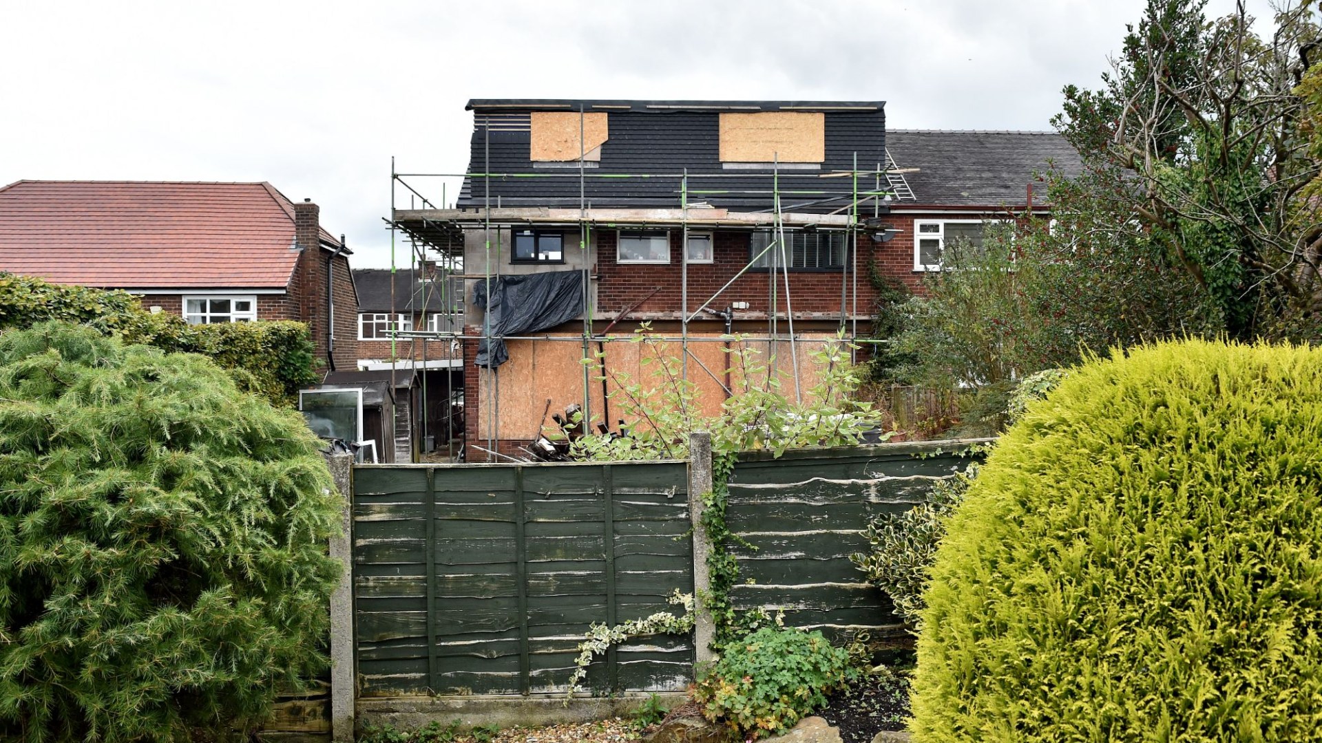 We're furious after our neighbour built a 'SKYSCRAPER' next door - it's a 'monstrosity' & now he can see into our homes