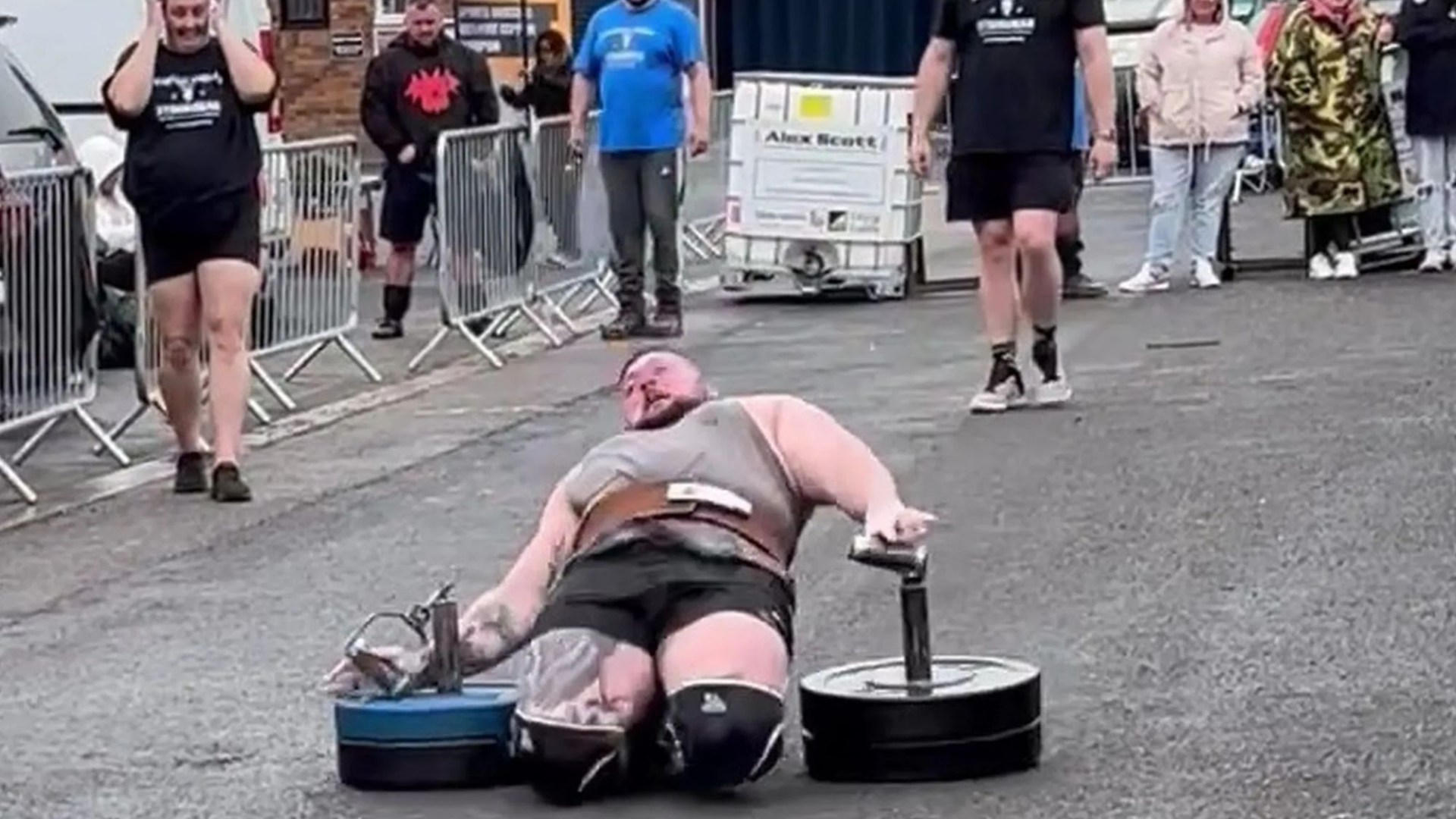 Horrifying moment dad's kneecaps 'shoot up into his THIGHS' after snapping two tendons during Strongman final