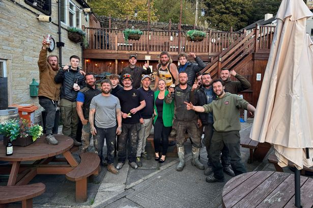 Moment Rose's rescuers celebrate down the pub after 8 days grafting to free her from rock