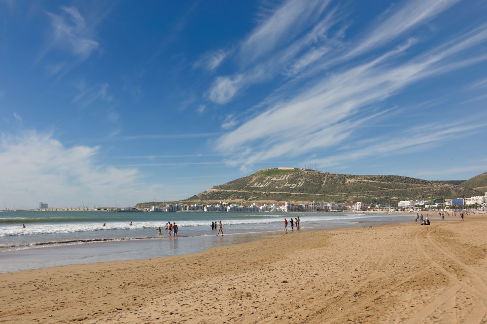 The eight mile beach is popular with sunbathers and surfers