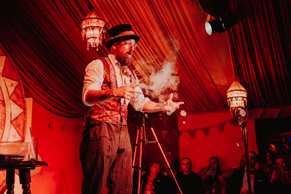 In the pre-show, performers in smaller circus tents show off everything from spoon bending to bubble-blowing