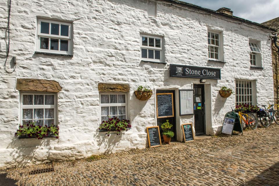 The village is home to white-washed stone cottages