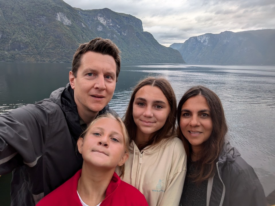 Ryan with his family in the fjords