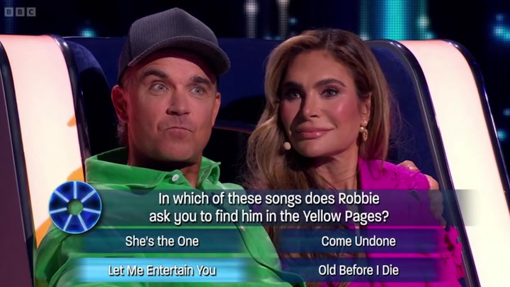 Awkward moment Robbie Williams forgets words to own song on Michael McIntyre