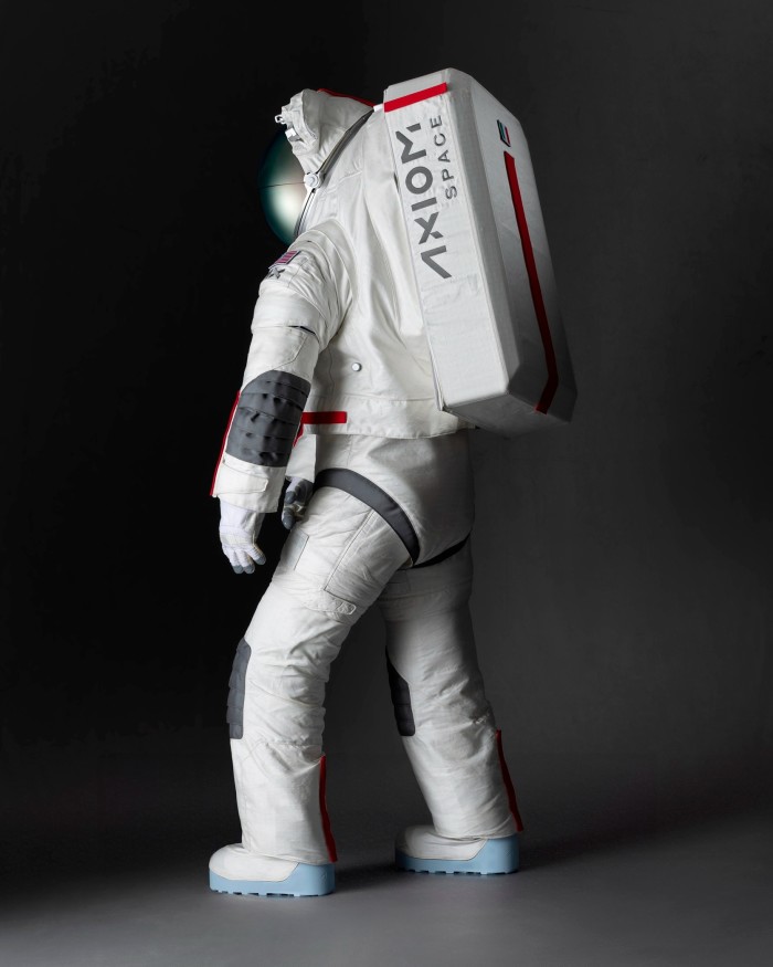 The spacesuit seen from the side, with large boxy backpack