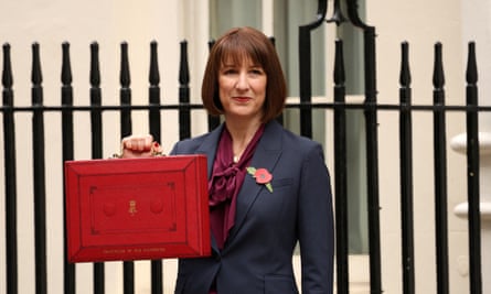 Rachel Reeves posing with the red budget box in Downing Street