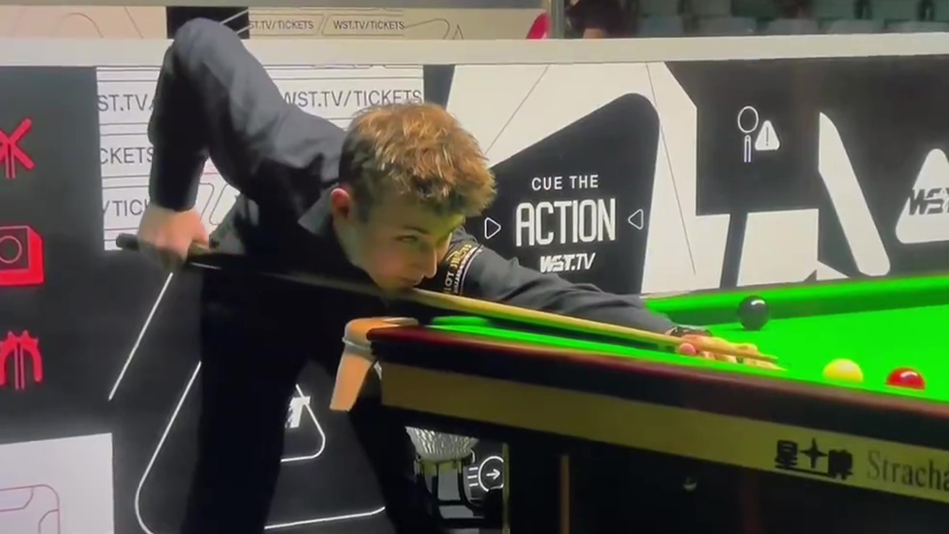 Snooker star and notorious hothead smashes cue on the floor before referee intervenes in ill-tempered clash