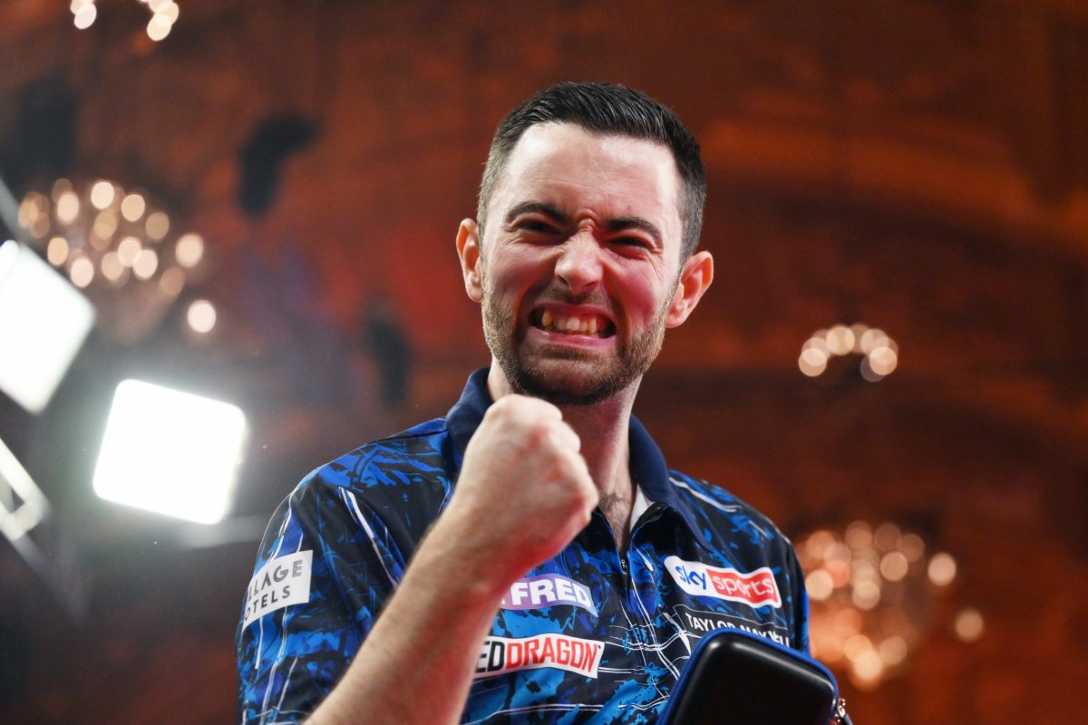 BLACKPOOL, ENGLAND - JULY 20: Luke Humphries of England celebrates winning against James Wade of England during the 2024 Betfred World Matchplay semi-finals at Winter Gardens on July 20, 2024 in Blackpool, England. (Photo by Ben Roberts Photo/Getty Images)