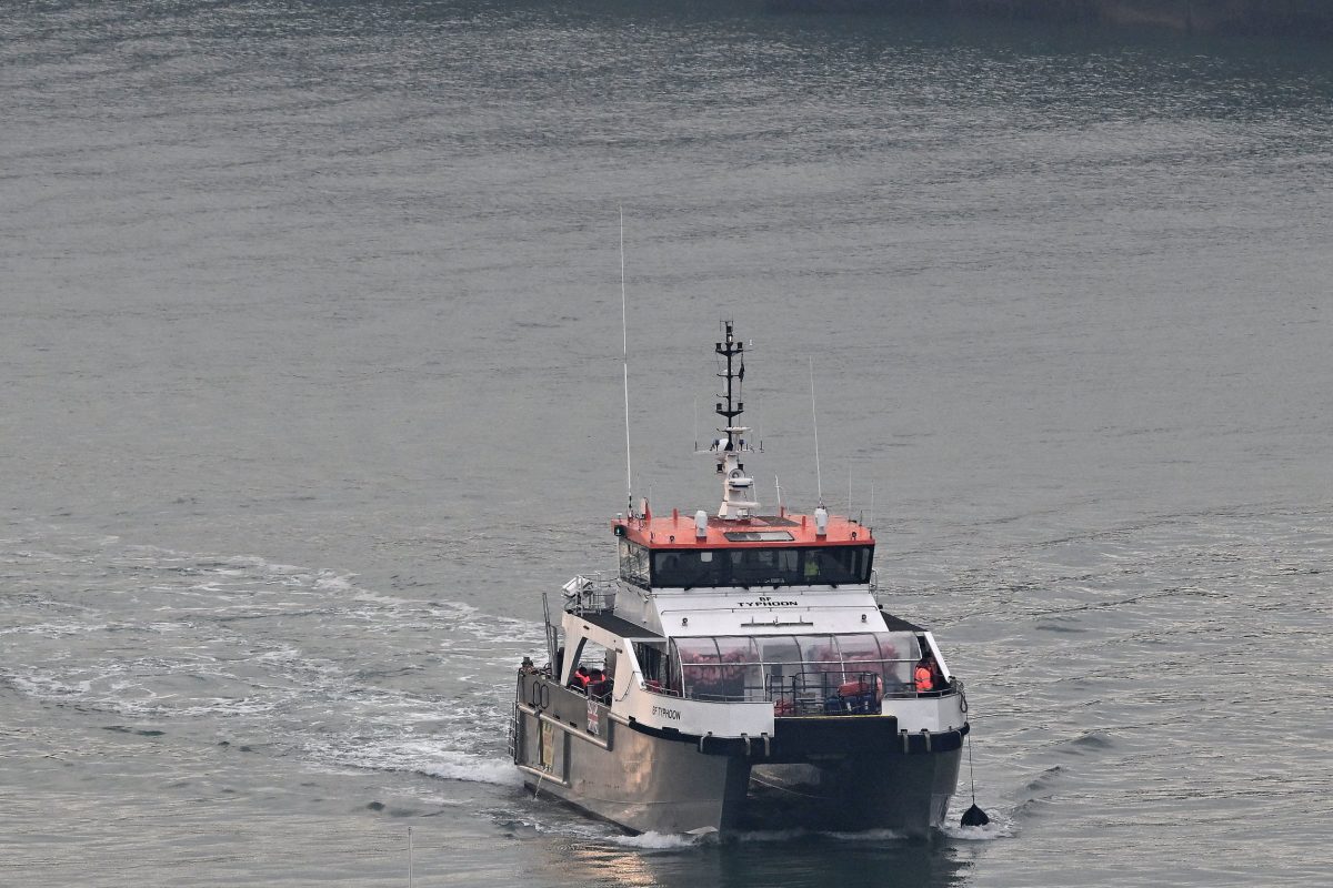 Border Force vessel "BF Typhoon", carrying migrants picked up at sea attempting to cross the English Channel from France, arrives at the Marina in Dover, southeast England, on September 21, 2024. (Photo by Ben STANSALL / AFP) (Photo by BEN STANSALL/AFP via Getty Images)