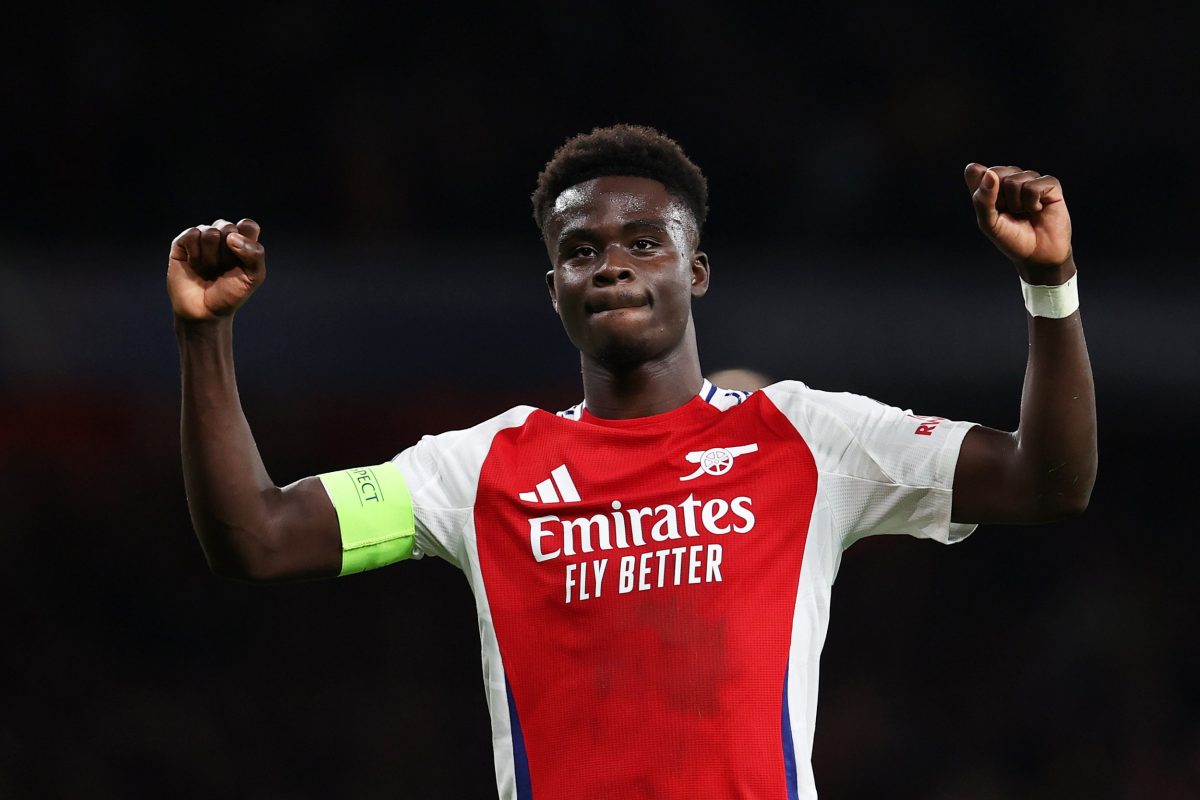 LONDON, ENGLAND - OCTOBER 01: Bukayo Saka of Arsenal celebrates scoring his team's second goal during the UEFA Champions League 2024/25 League Phase MD2 match between Arsenal FC and Paris Saint-Germain at Emirates Stadium on October 01, 2024 in London, England. (Photo by Ryan Pierse - UEFA/UEFA via Getty Images)