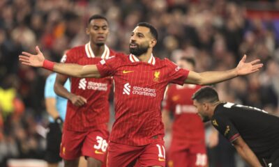 Liverpool's Mohamed Salah celebrates after scoring his side's second goal during the Champions League soccer match between Liverpool and Bologna at the Anfield stadium in Liverpool, England, Wednesday, Oct. 2, 2024. (AP Photo/Ian Hodgson)