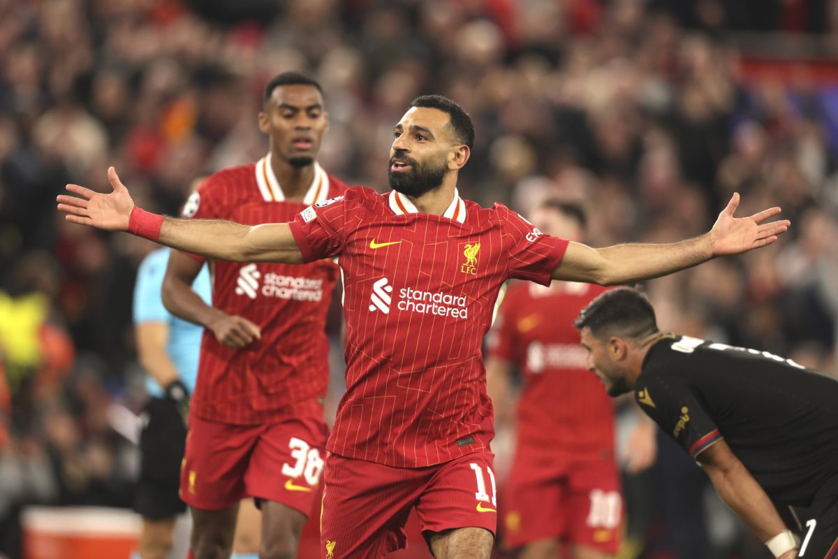 Liverpool's Mohamed Salah celebrates after scoring his side's second goal during the Champions League soccer match between Liverpool and Bologna at the Anfield stadium in Liverpool, England, Wednesday, Oct. 2, 2024. (AP Photo/Ian Hodgson)