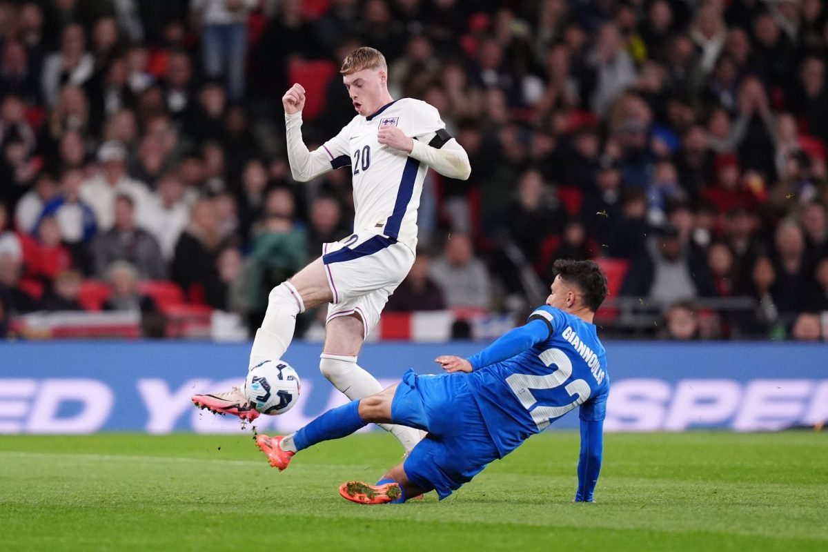 England's Cole Palmer (left) and Greece's Dimitrios Giannoulis battle for the ball during the UEFA Nations League Group B2 match at Wembley Stadium, London. Picture date: Thursday October 10, 2024. PA Photo. See PA story SOCCER England. Photo credit should read: John Walton/PA Wire. RESTRICTIONS: Use subject to FA restrictions. Editorial use only. Commercial use only with prior written consent of the FA. No editing except cropping.