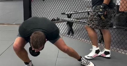 Video: Justin Gaethje crumpled by coach during body shot challenge in training