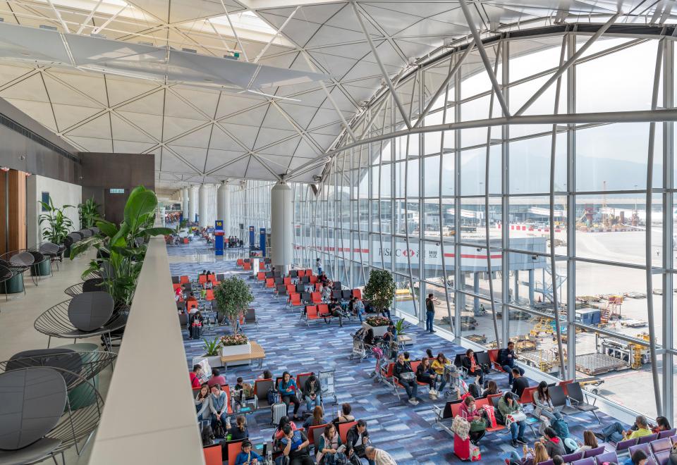 Travellers should go and see the city if they have a layover of several hours - picture shows Hong Kong International Airport