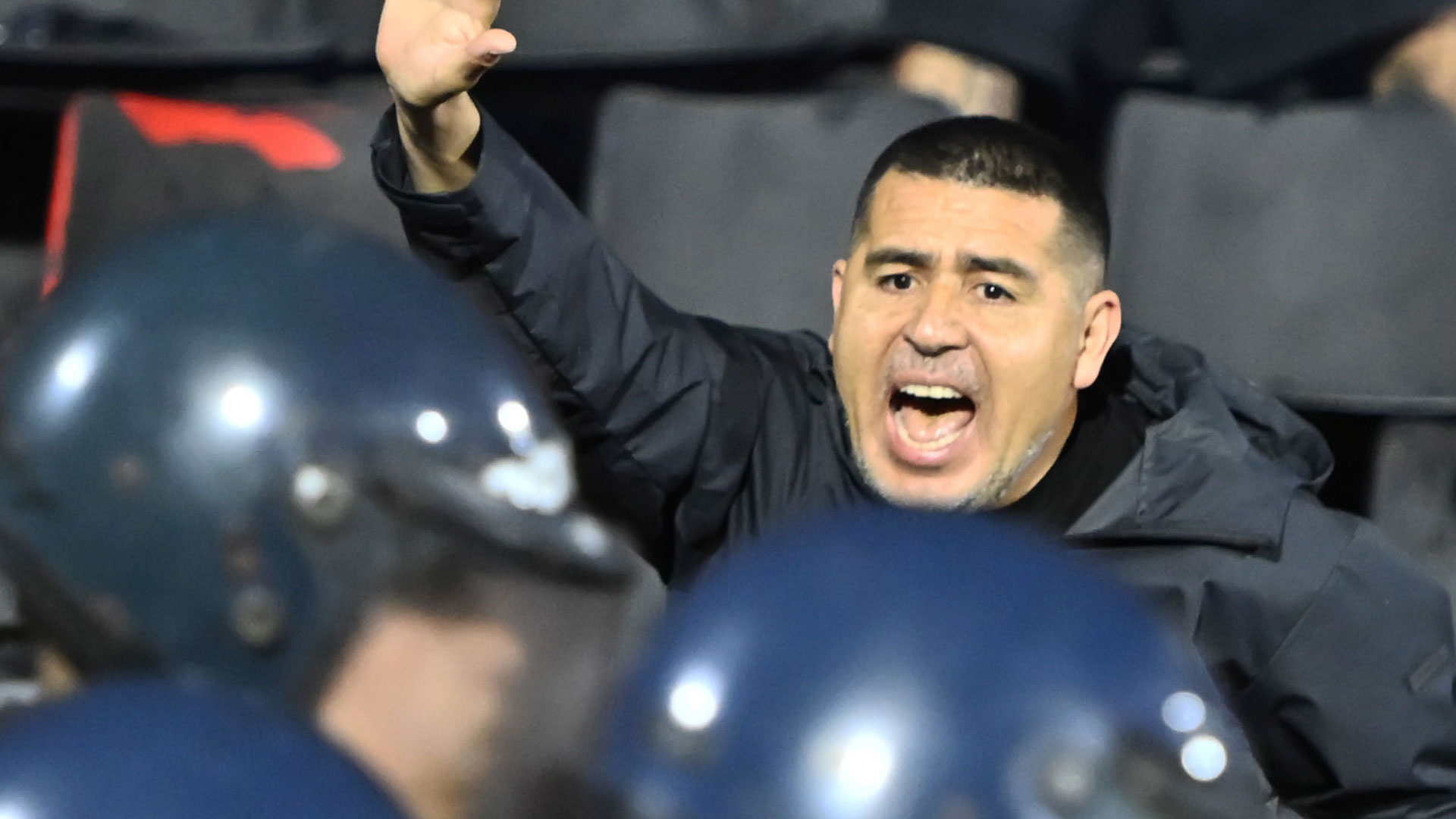 Shock moment Argentina legend steps in to stop chaos in Boca Juniors clash after riot police deployed tear gas