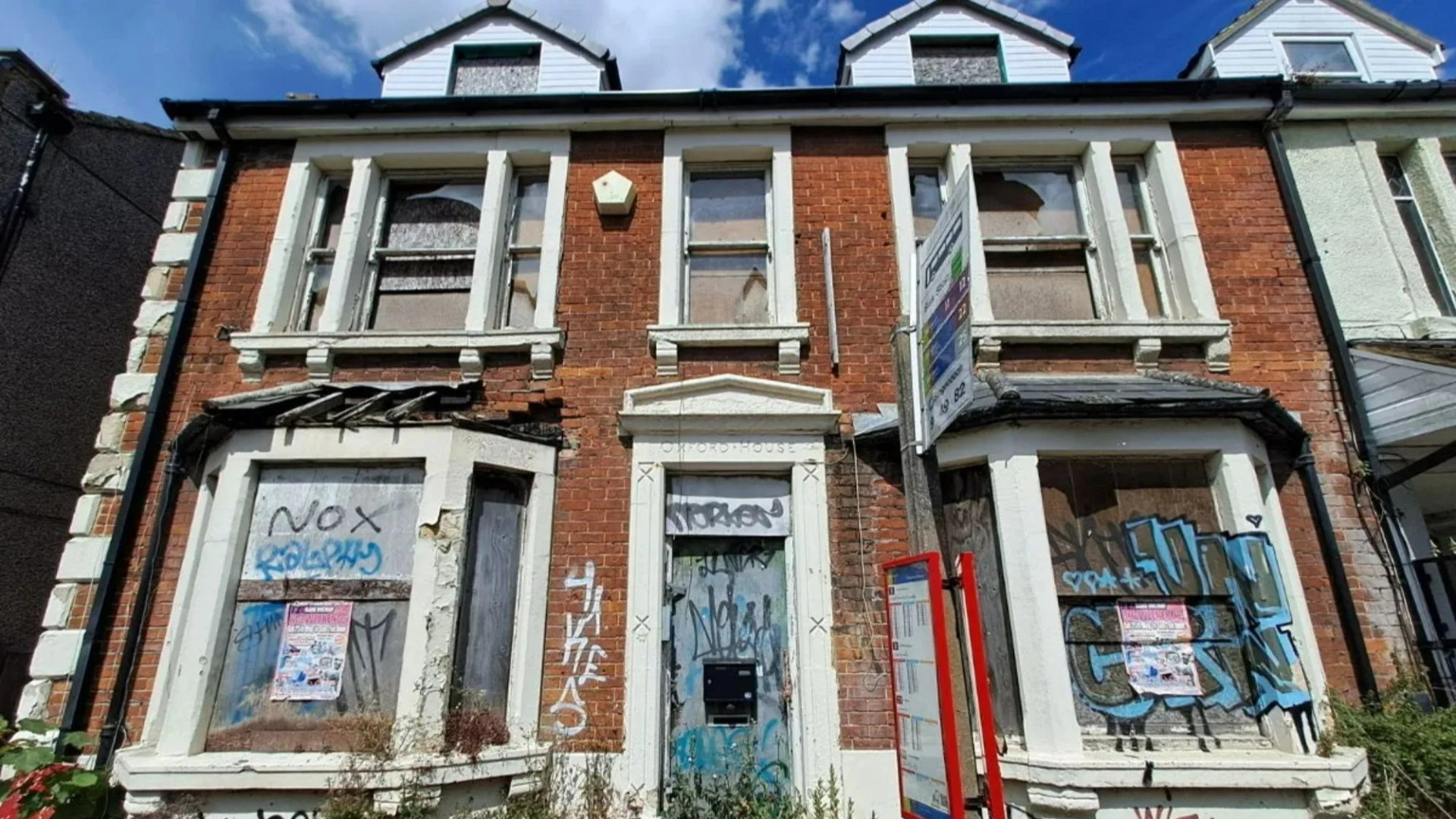 'It looks like a bombsite!' Neighbours on 'poshest street' fume over 'eyesore' derelict home abandoned for 20 years