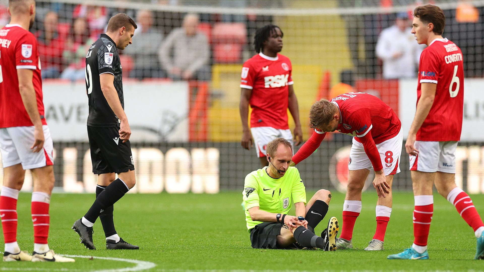 Wrexham clash delayed after referee injured twice as home and away fans sing brutal chant during substitution