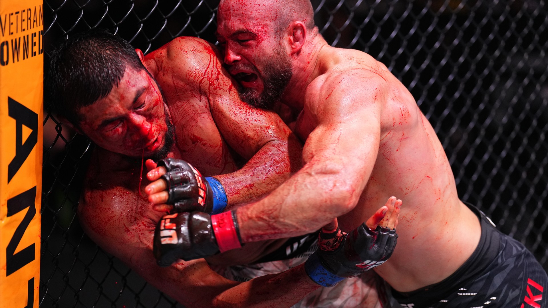 UFC star's eye completely closes as fans convinced sickening injury cost him victory in 'fight of the year'