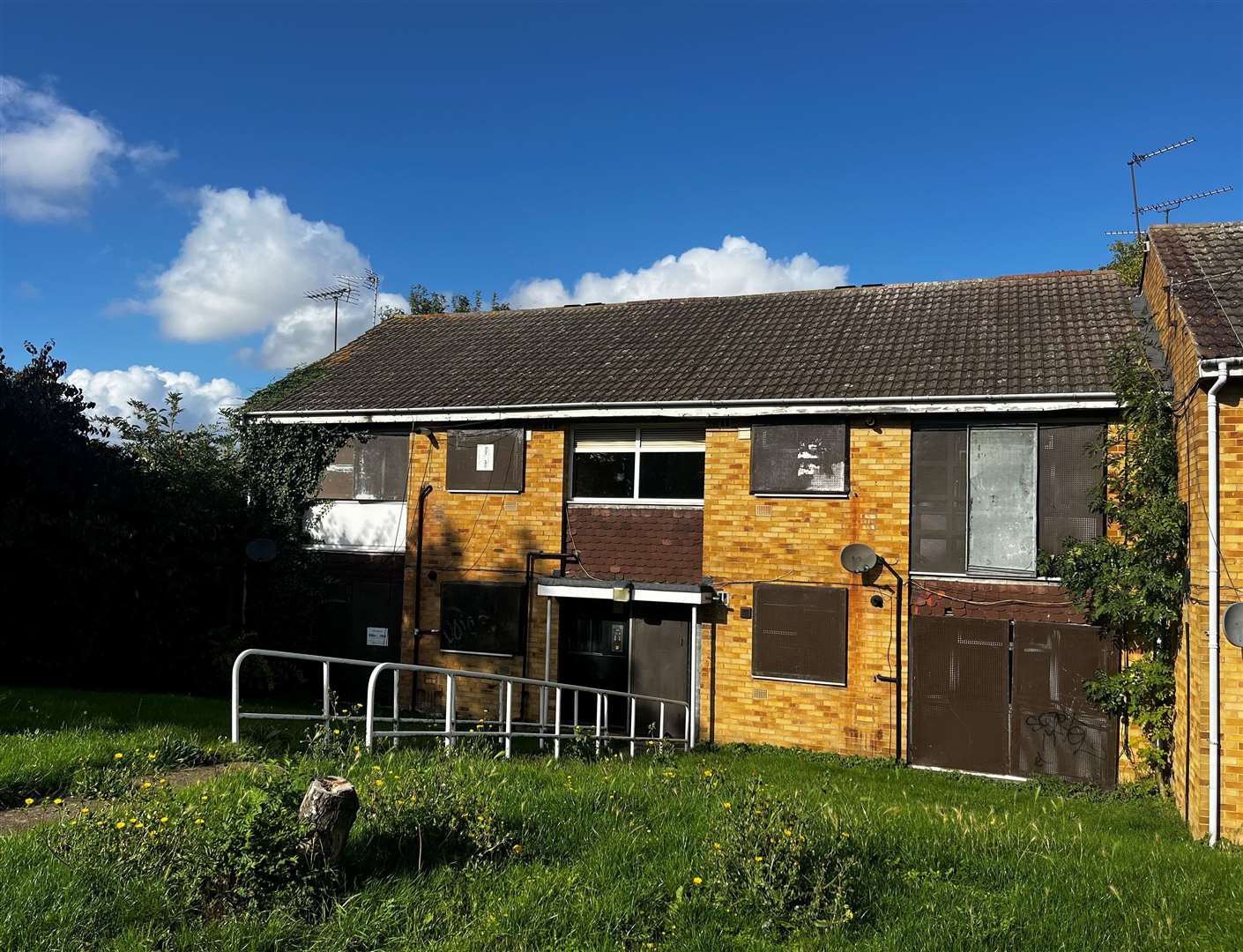 Neighbours fume over 'eyesore' derelict estate as last-man standing locals refuse to leave so block can be flattened