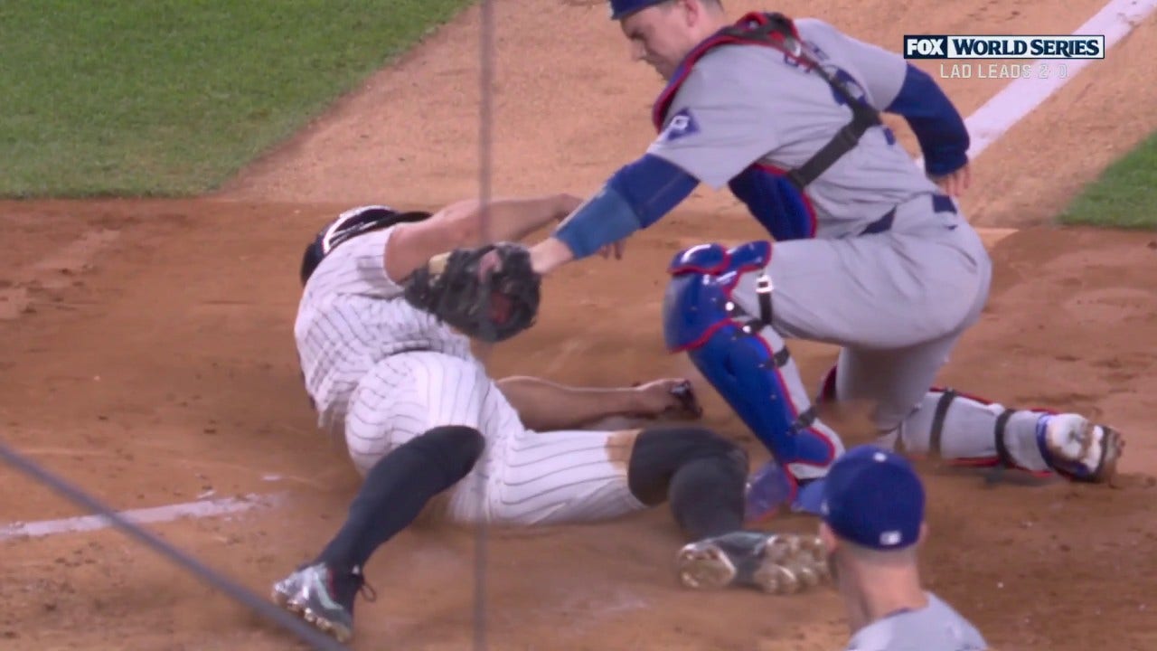 Teoscar Hernández executes an amazing throw to nail Giancarlo Stanton at the plate