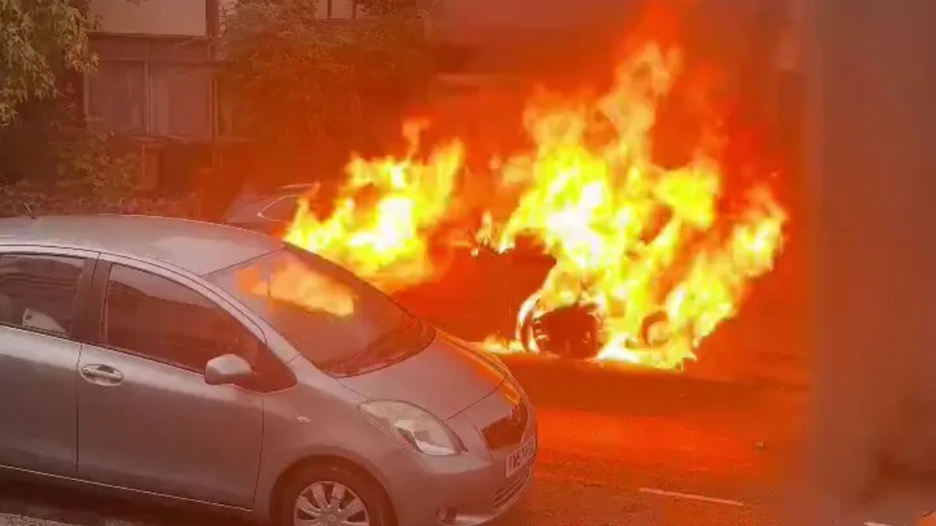 Terrifying moment electric car burns in massive fire - leaving it completely destroyed