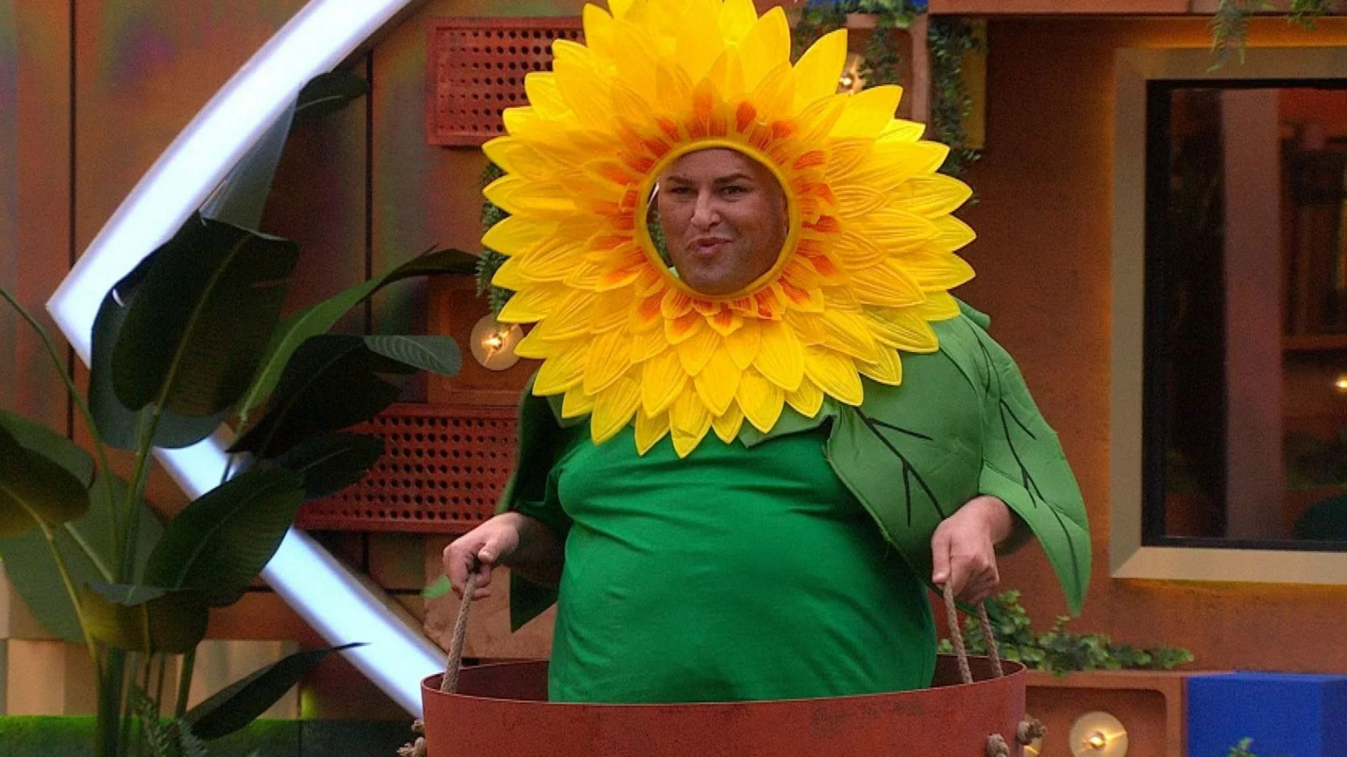 Celebrity Big Brother winner returns to BB house by sneaking into a task dressed as a flower pot