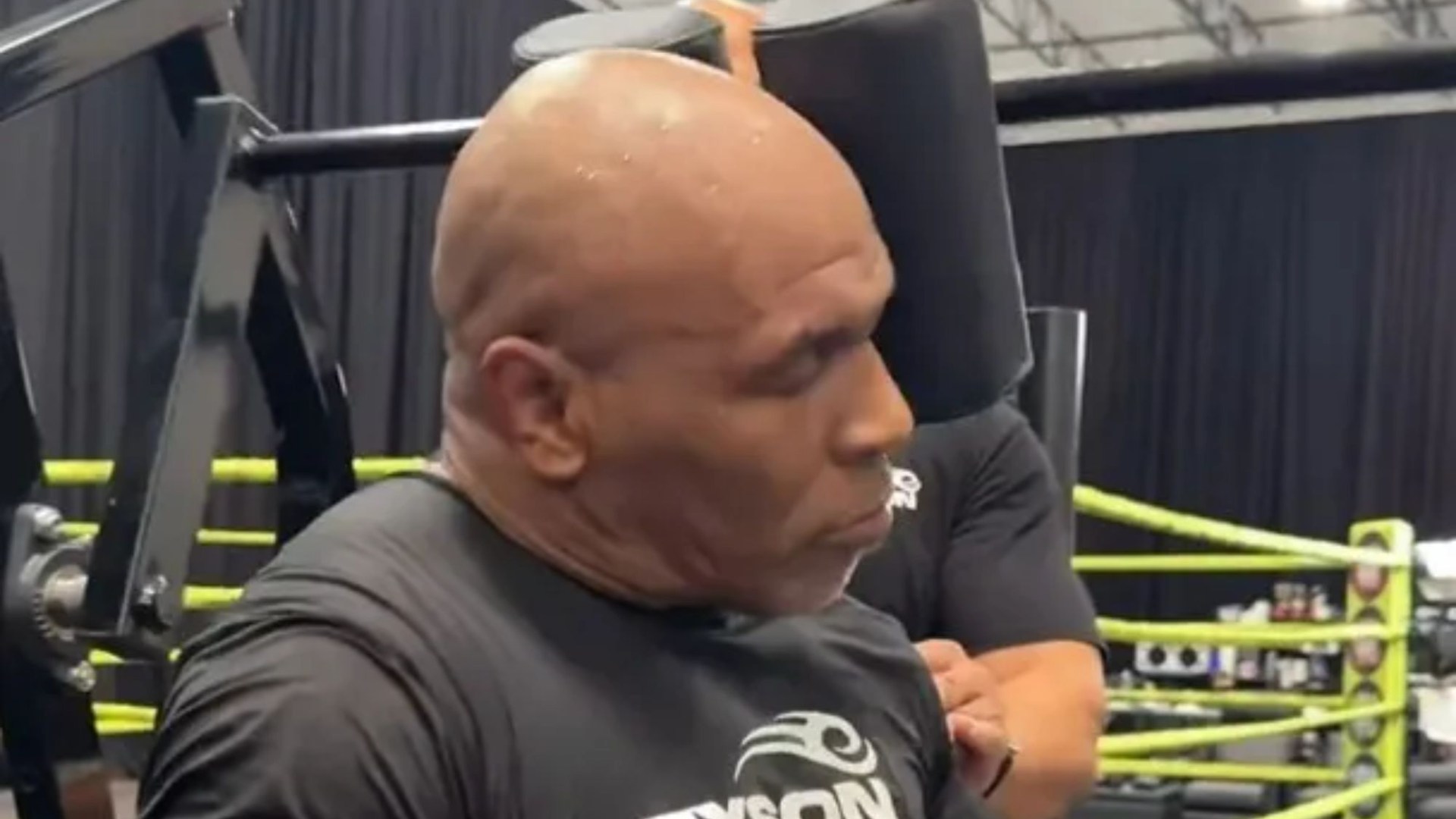 Mike Tyson, 58, shows off gruelling NECK exercises as he fires X-rated warning to Jake Paul