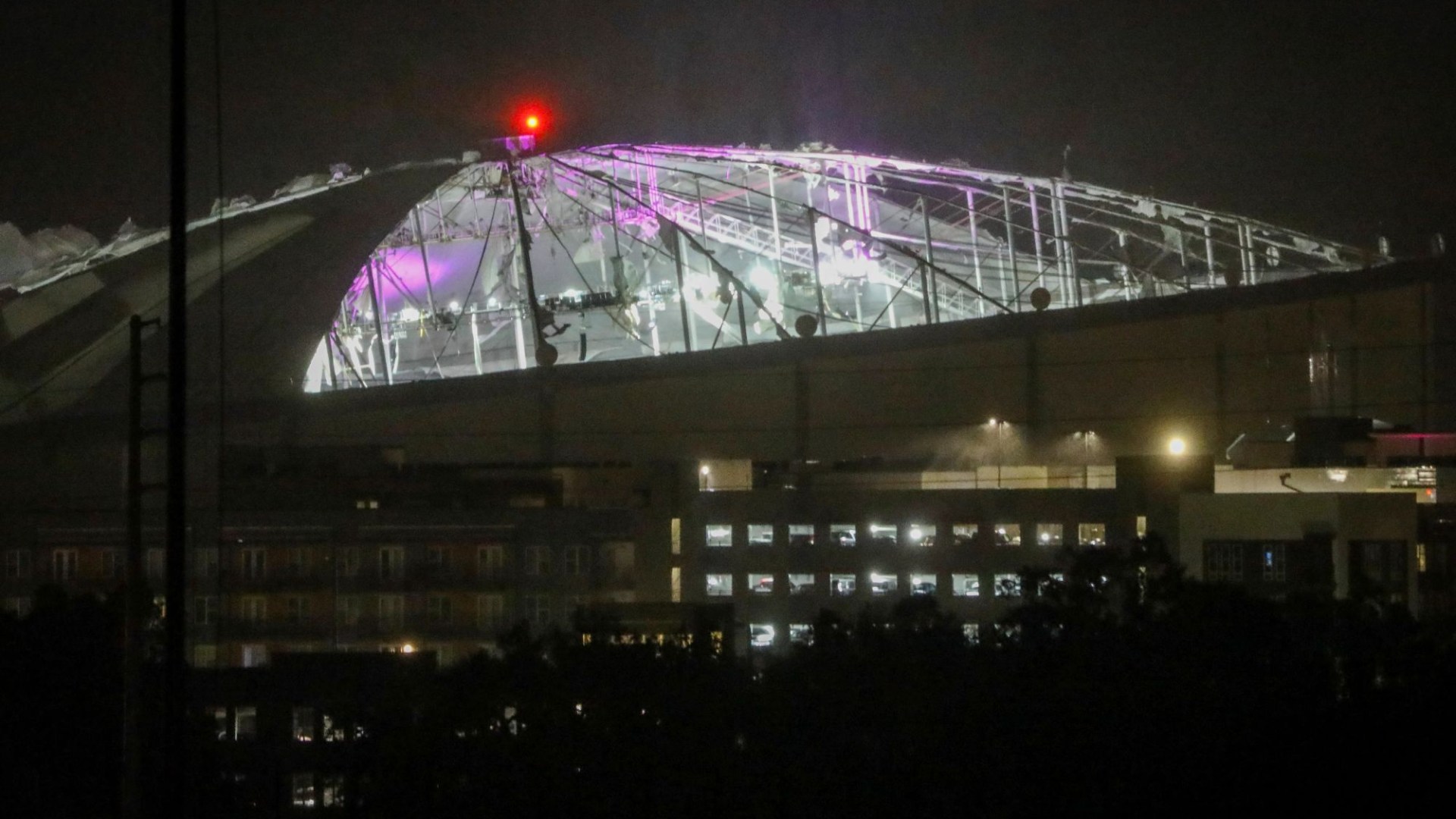 Watch moment Hurricane Milton rips roof off Tropicana Field Stadium which was being used as base for emergency workers