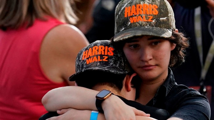 Supporters of Democratic presidential nominee Kamala Harris embrace following Harris’ remarks conceding the 2024 US presidential election to Donald Trump