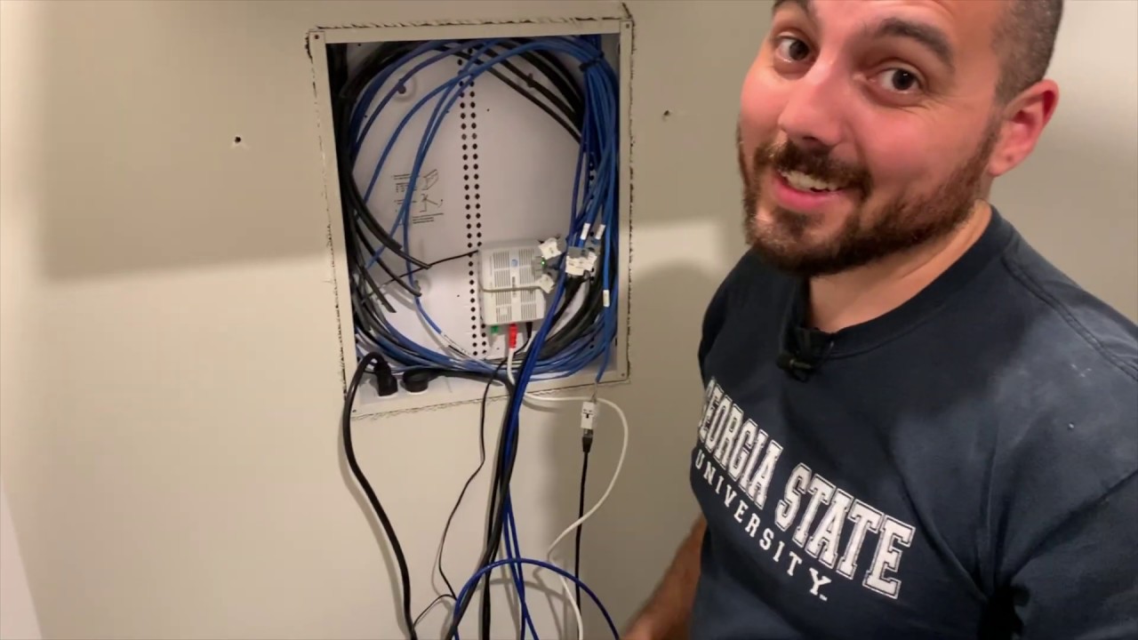 Installing a Tripp Lite network rack in my home network closet / server closet