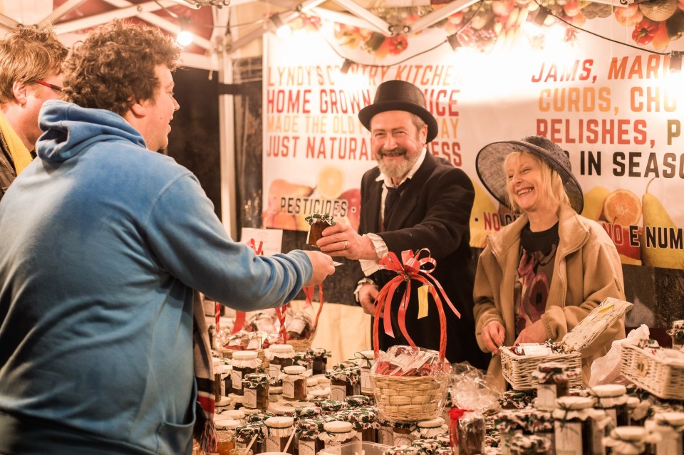 Stilt walkers move through the fayre, keeping visitors entertained