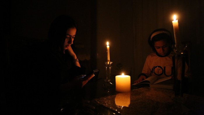 People light candles as power outage crisis hit Tehran