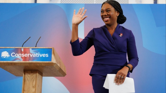 Kemi Badenoch waving