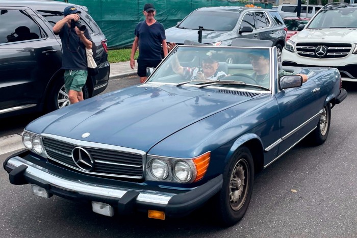 Rudy Giuliani in the passenger seat of a Mercedes at the same polling place where Donald Trump cast his ballot on November 5 2024 in Palm Beach, Florida