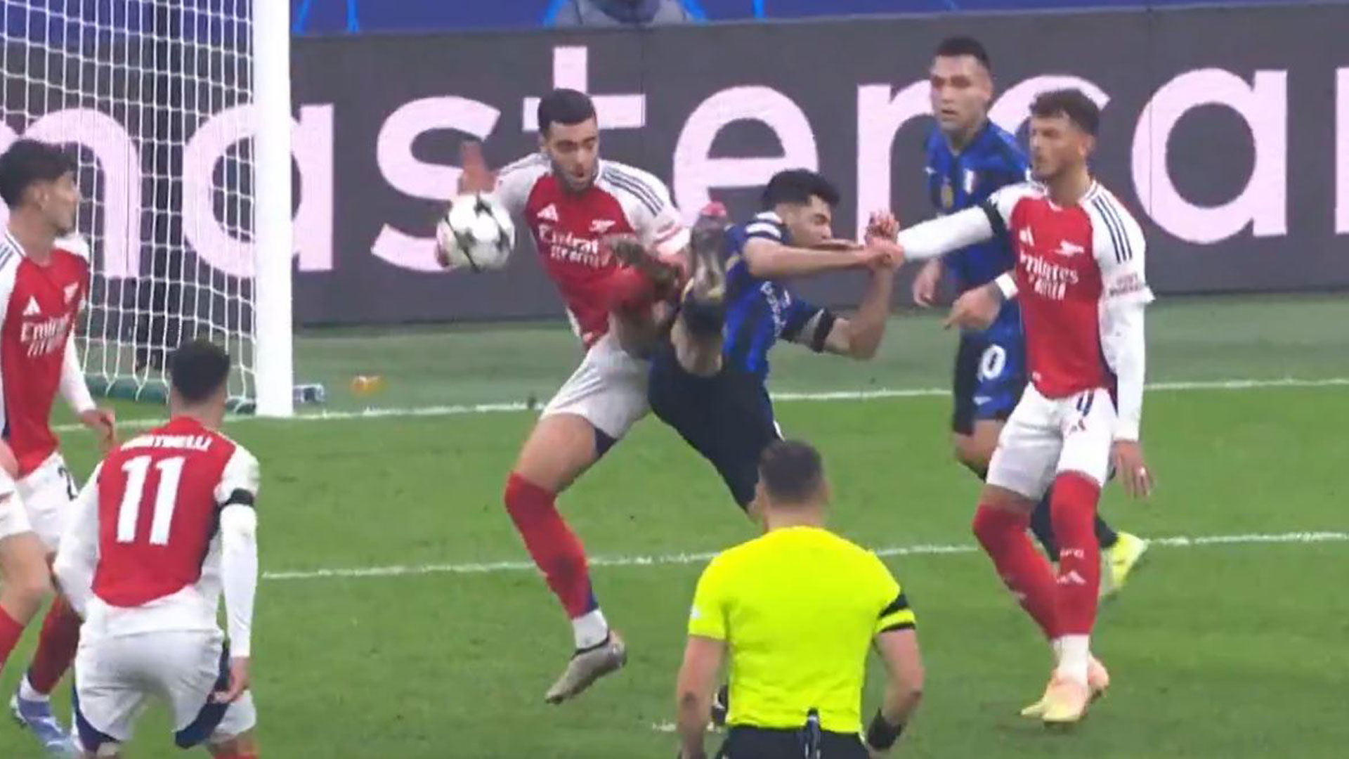 Arsenal fans fume after conceding 'diabolical' penalty just seconds after Lautaro Martinez controversially avoids red