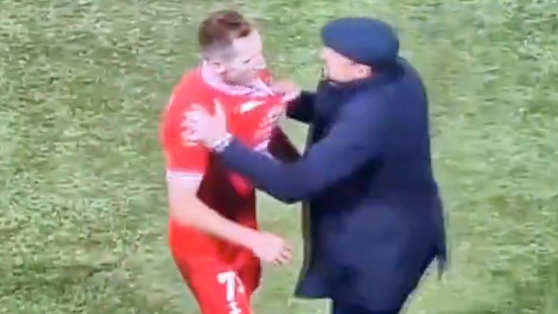 Shock moment former EFL boss grabs his own player and furiously shoves him after receiving red card