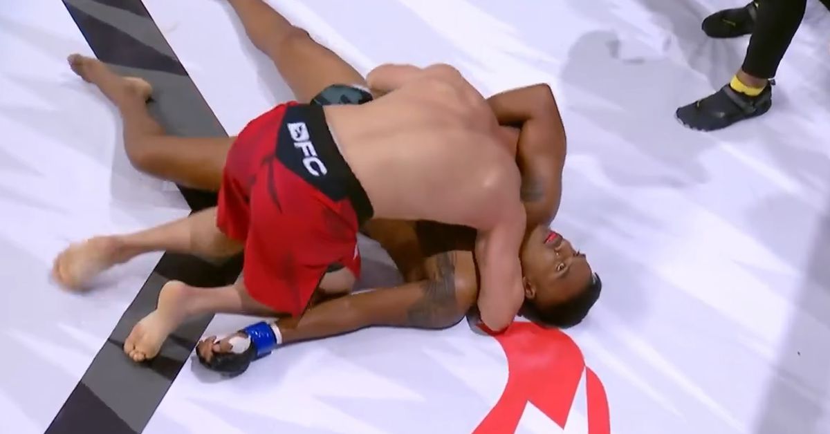 Watch negligent referee ignore choked-out fighter, call for more action