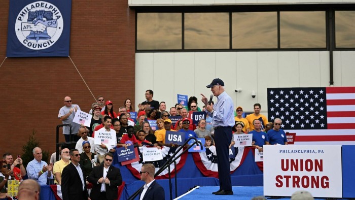 US President Joe Biden addresses workers at a factory