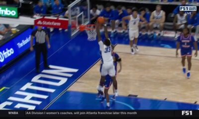 Fredrick King soars for a strong two-handed alley-oop to extend No. 14 Creighton