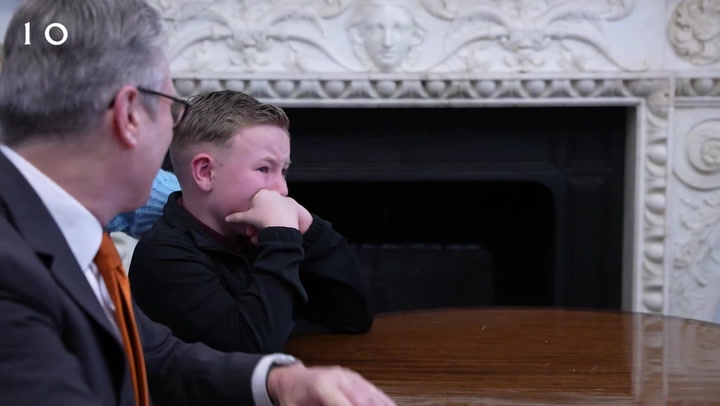 Starmer comforts emotional young boy on surprise Christmas video call to military mother