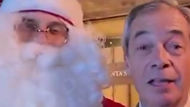 Nigel Farage makes rare trip to Clacton constituency... with Father Christmas